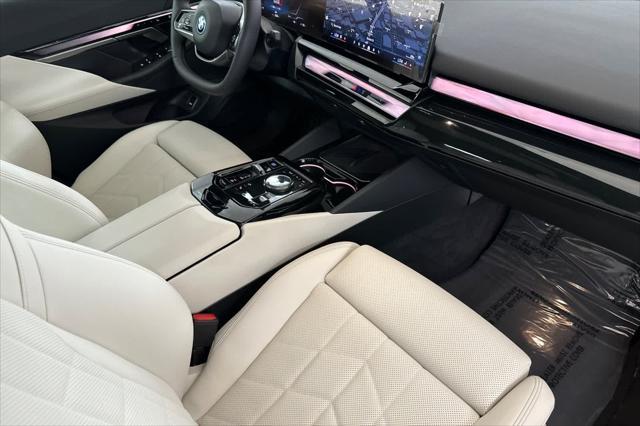 used 2024 BMW i5 car, priced at $60,000