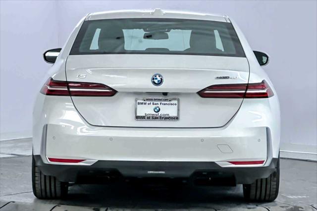 used 2024 BMW i5 car, priced at $59,898