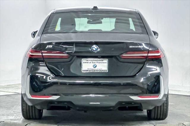 used 2024 BMW i5 car, priced at $61,998