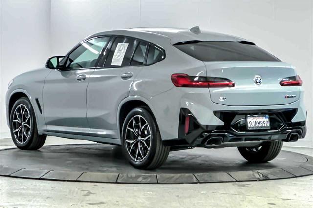 used 2024 BMW X4 car, priced at $62,098