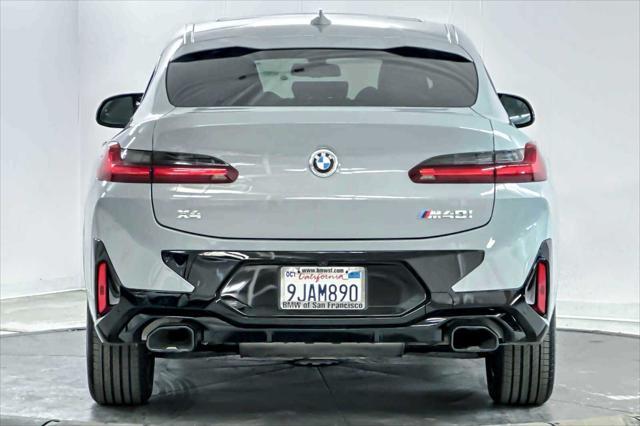 used 2024 BMW X4 car, priced at $62,098