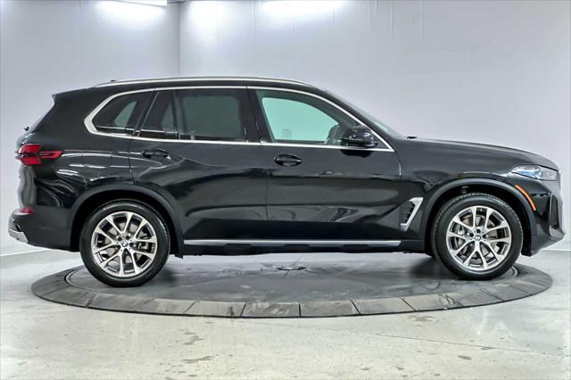 used 2025 BMW X5 car, priced at $69,498