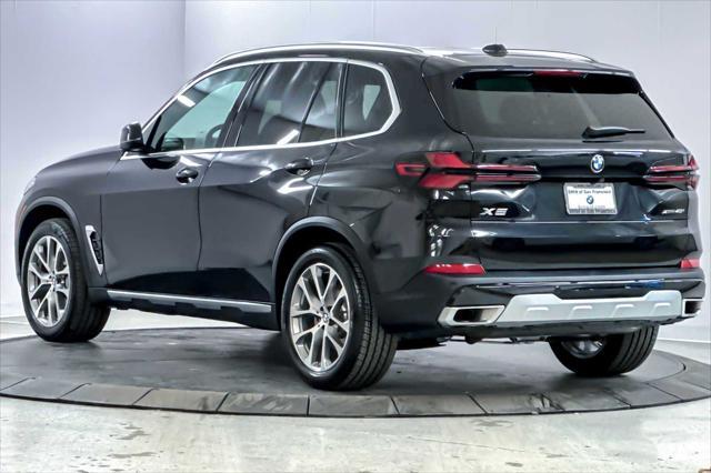 used 2025 BMW X5 car, priced at $69,498