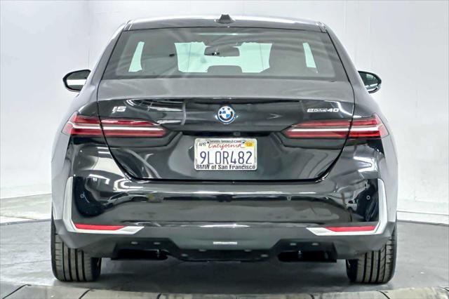 used 2024 BMW i5 car, priced at $60,850