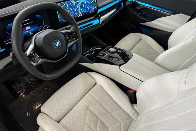 used 2024 BMW i5 car, priced at $59,798