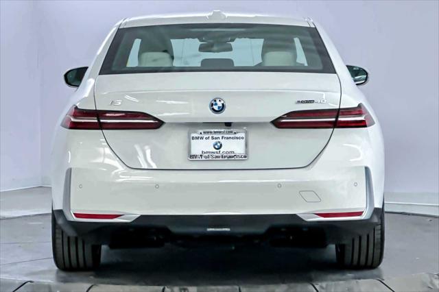 used 2024 BMW i5 car, priced at $59,798