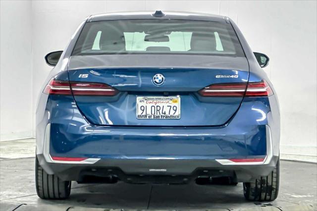 used 2024 BMW i5 car, priced at $61,560