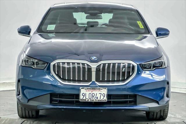 used 2024 BMW i5 car, priced at $61,560