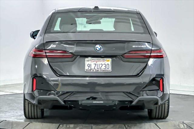 used 2024 BMW i5 car, priced at $66,750