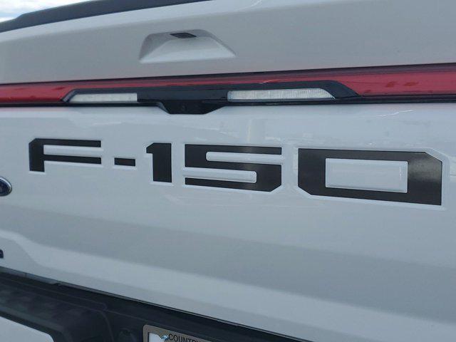 used 2023 Ford F-150 Lightning car, priced at $58,995
