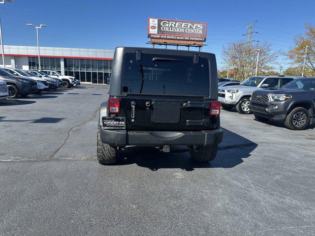 used 2013 Jeep Wrangler Unlimited car, priced at $11,395