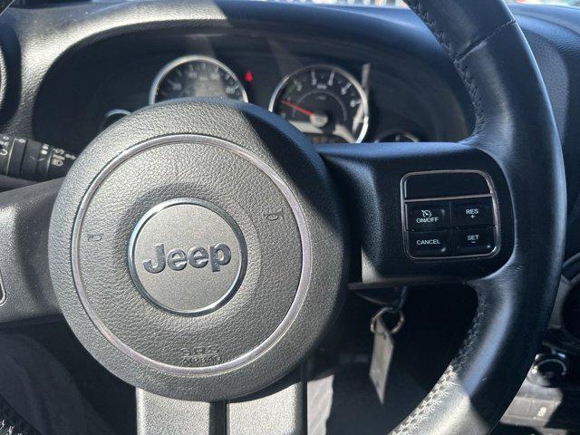 used 2013 Jeep Wrangler Unlimited car, priced at $11,395