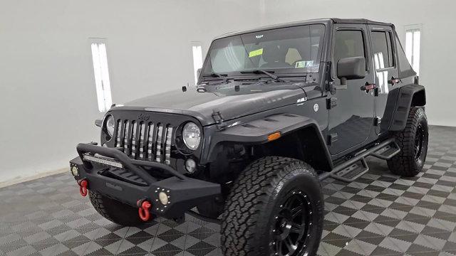 used 2016 Jeep Wrangler Unlimited car, priced at $15,860