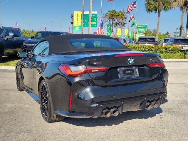 used 2024 BMW M4 car, priced at $70,980