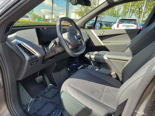 used 2024 BMW iX car, priced at $63,990