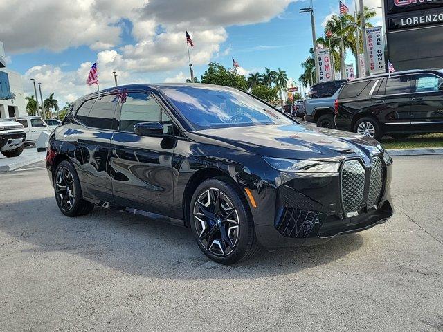 used 2024 BMW iX car, priced at $63,990