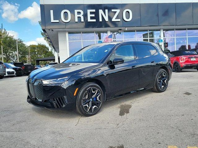 used 2024 BMW iX car, priced at $59,880