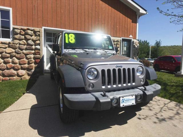 used 2018 Jeep Wrangler JK Unlimited car, priced at $23,550