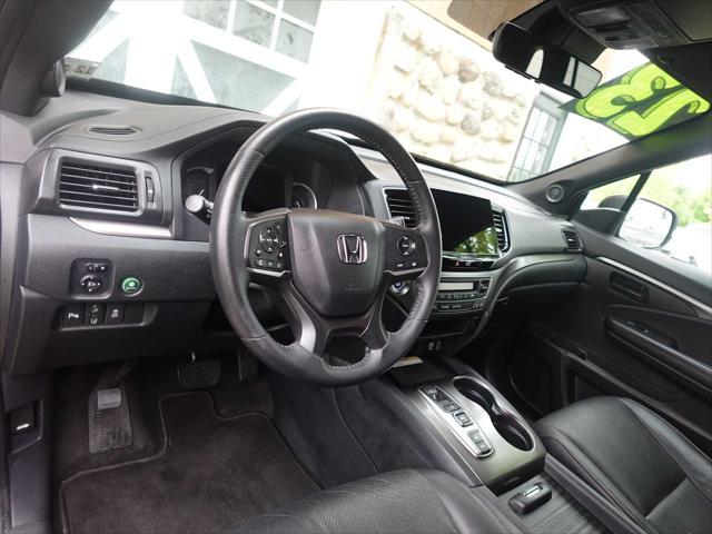used 2023 Honda Passport car, priced at $33,495