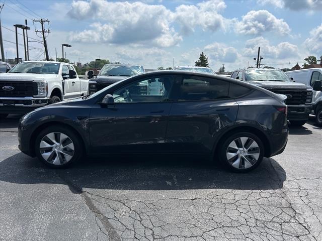 used 2024 Tesla Model Y car, priced at $34,995