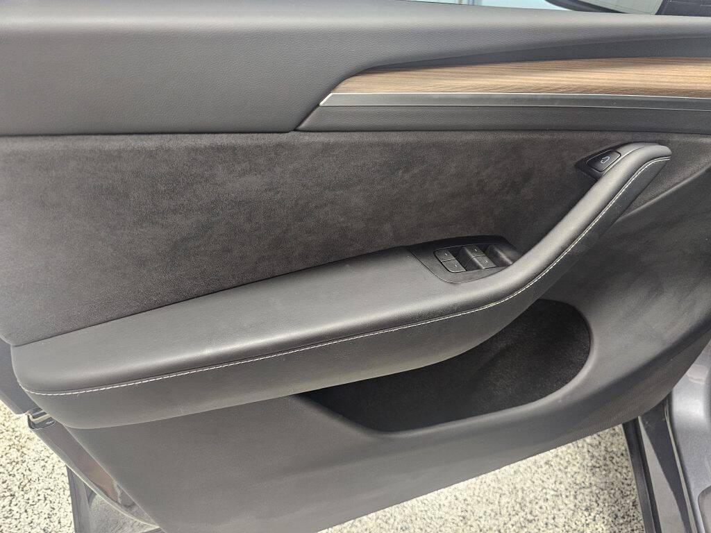 used 2023 Tesla Model Y car, priced at $34,995