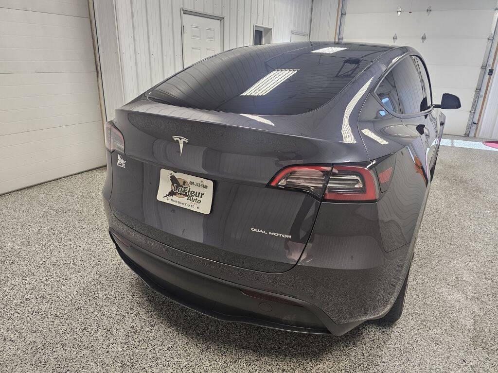 used 2023 Tesla Model Y car, priced at $34,995