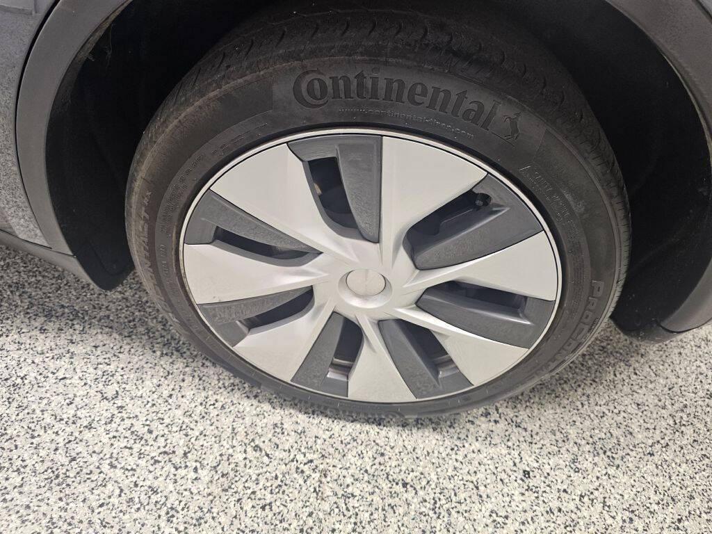 used 2023 Tesla Model Y car, priced at $34,995