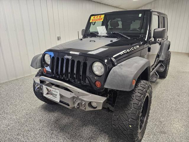 used 2011 Jeep Wrangler Unlimited car, priced at $14,995