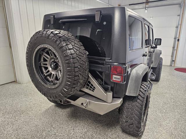 used 2011 Jeep Wrangler Unlimited car, priced at $14,995