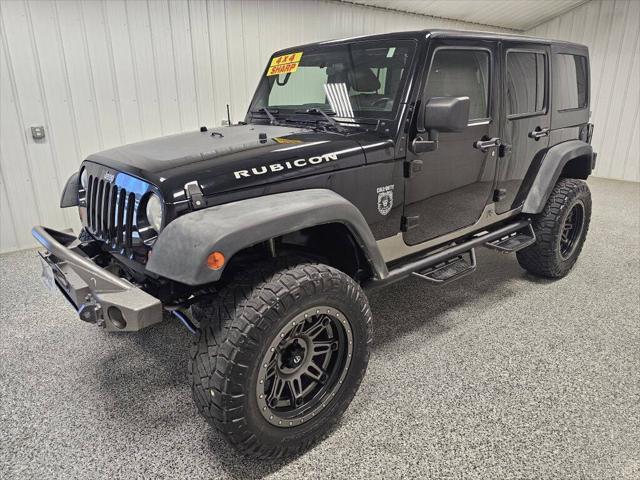 used 2011 Jeep Wrangler Unlimited car, priced at $14,995