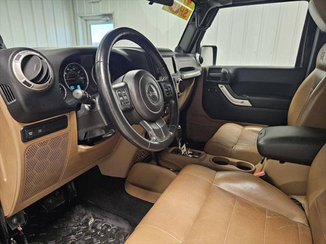 used 2011 Jeep Wrangler Unlimited car, priced at $14,995