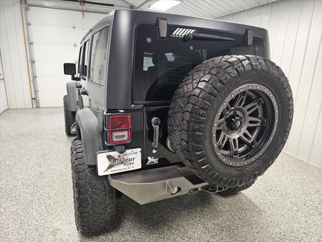 used 2011 Jeep Wrangler Unlimited car, priced at $14,995