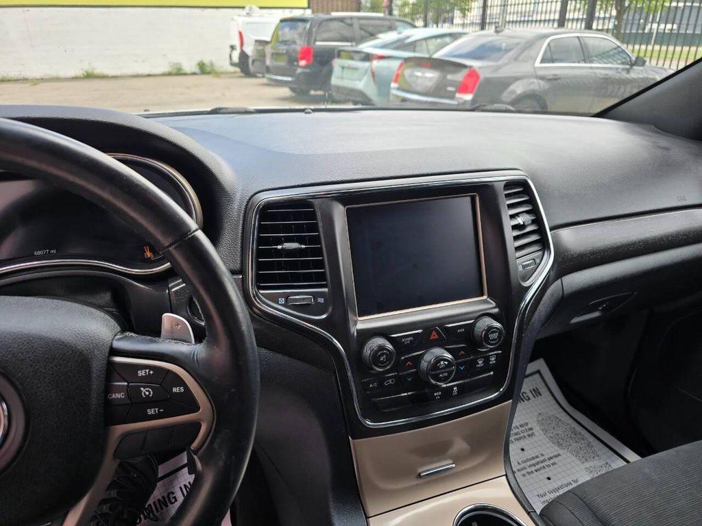 used 2015 Jeep Grand Cherokee car, priced at $14,500