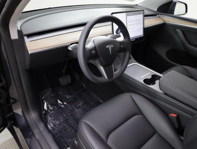 used 2024 Tesla Model Y car, priced at $38,865