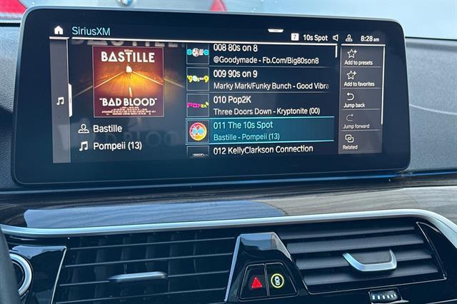 used 2023 BMW 530e car, priced at $32,706