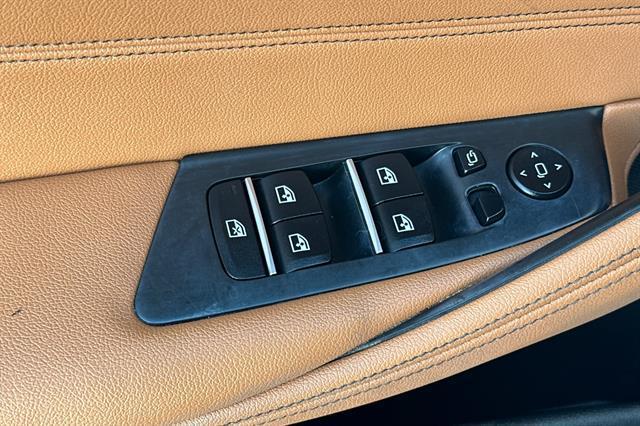 used 2023 BMW 530e car, priced at $32,706