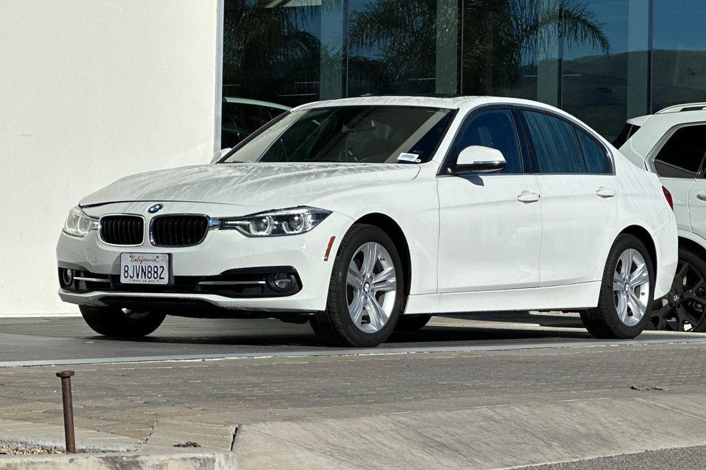 used 2018 BMW 330 car, priced at $17,997
