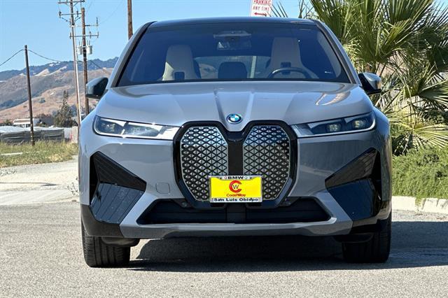 used 2025 BMW iX car, priced at $67,536