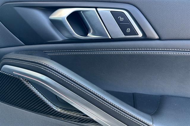 used 2023 BMW X6 car, priced at $68,097