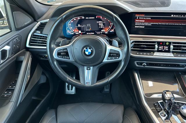 used 2023 BMW X6 car, priced at $68,097
