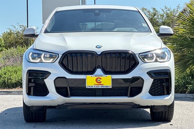 used 2023 BMW X6 car, priced at $68,097