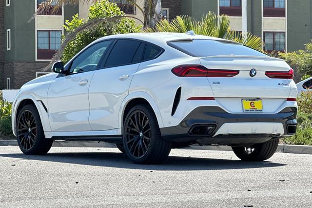 used 2023 BMW X6 car, priced at $68,097