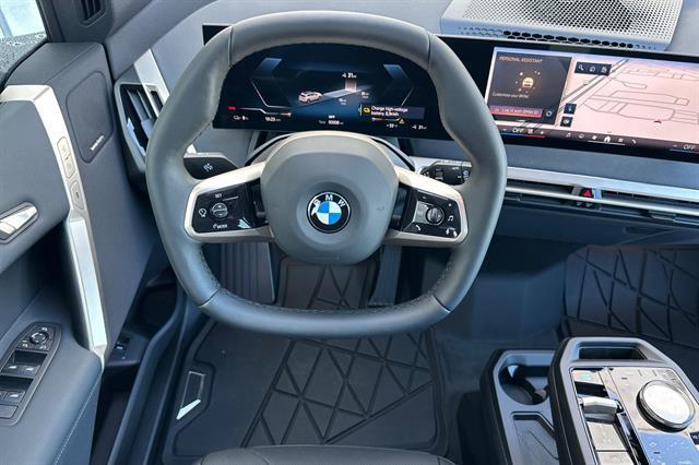 new 2026 BMW iX car, priced at $94,195