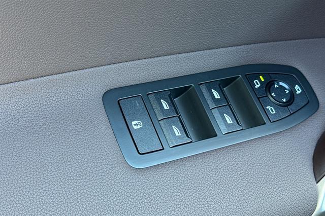 new 2026 BMW iX car, priced at $78,975