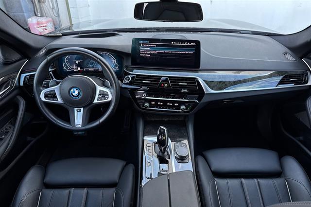 used 2023 BMW 530e car, priced at $38,042