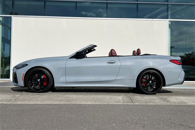 used 2023 BMW M4 car, priced at $53,896