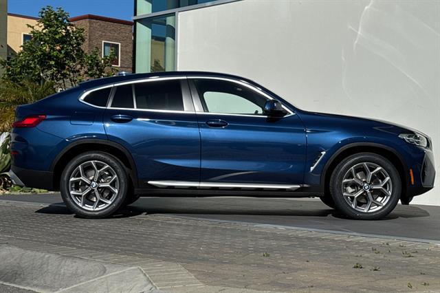 used 2023 BMW X4 car, priced at $40,504