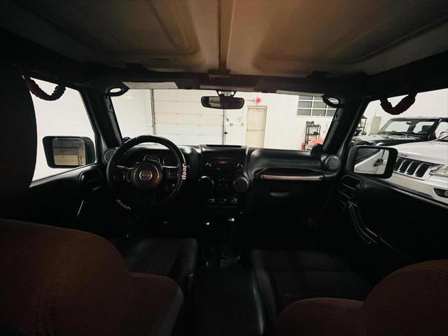 used 2011 Jeep Wrangler Unlimited car, priced at $12,900