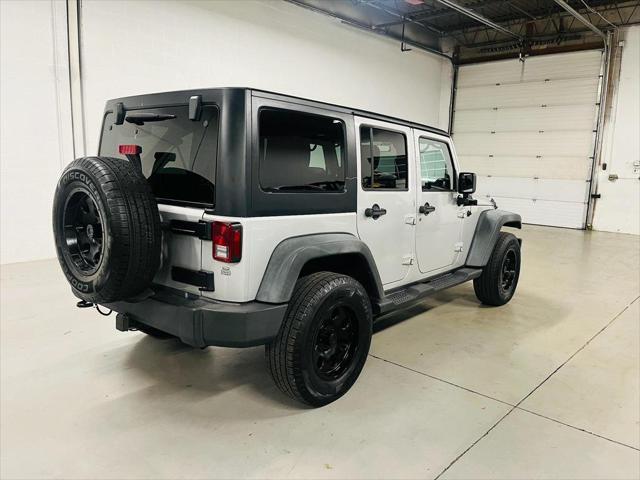 used 2011 Jeep Wrangler Unlimited car, priced at $12,900