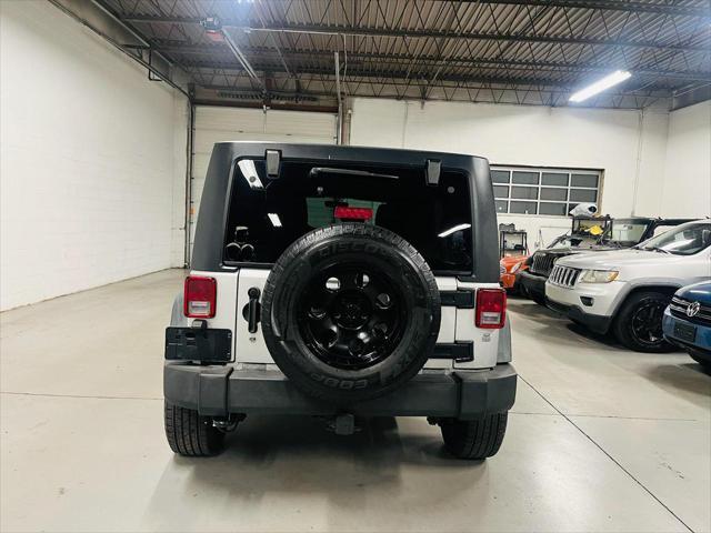 used 2011 Jeep Wrangler Unlimited car, priced at $12,900